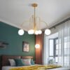 Modern Iron Chandelier with White Glass Shade